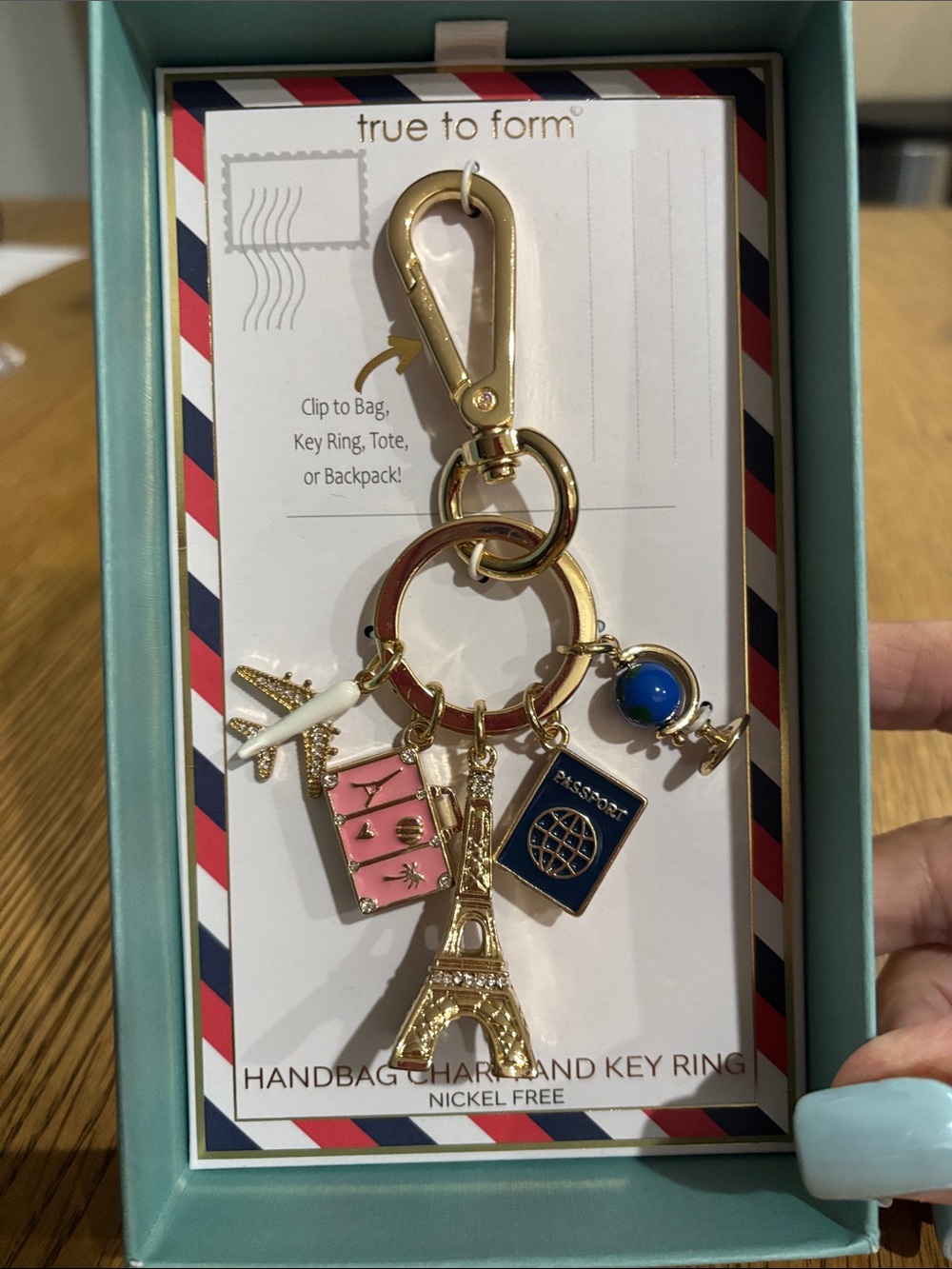 True to Form Gold Travel Charm Key Ring with Blue & Pink Accents